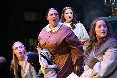 Actors on stage during a performance of "Little Women"