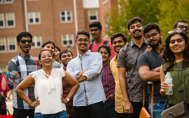 group of international students smiling at the camera