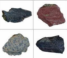 4 different colored rocks on a white background