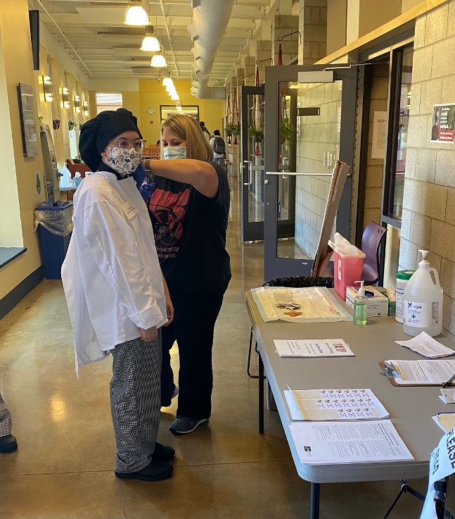 Person receiving a flu vaccine at the flu clinic, held October 23 at IUP Punxsutawney