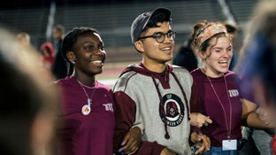 group of male and female students taking part in an activity during welcome week