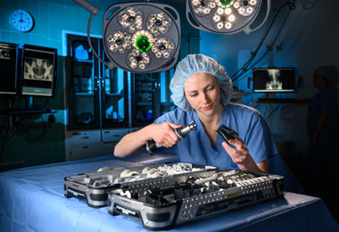 a young woman using lab equipment