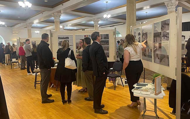 Students presenting their Capstone Projects in the Blue Room in Sutton Hall