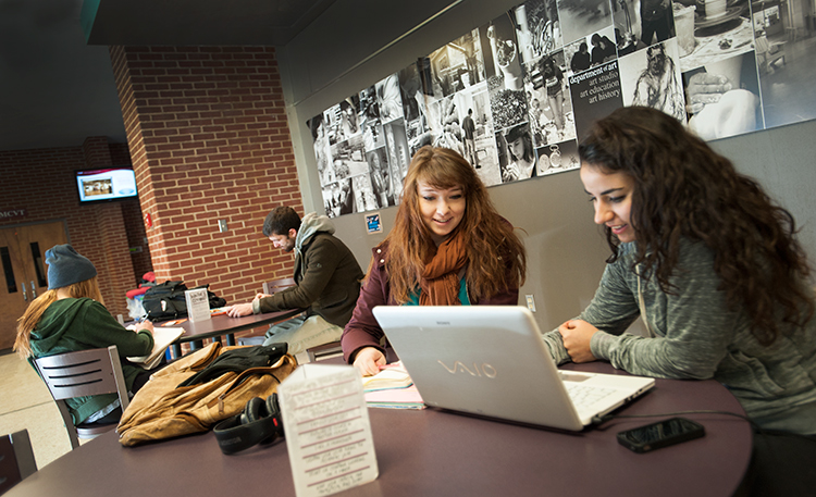 Students in the lobby of Sprowls 