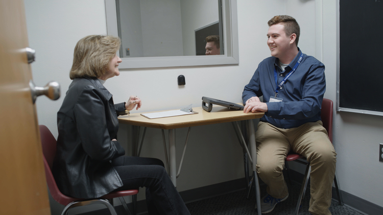 SLP Student Clinician Provides Treatment