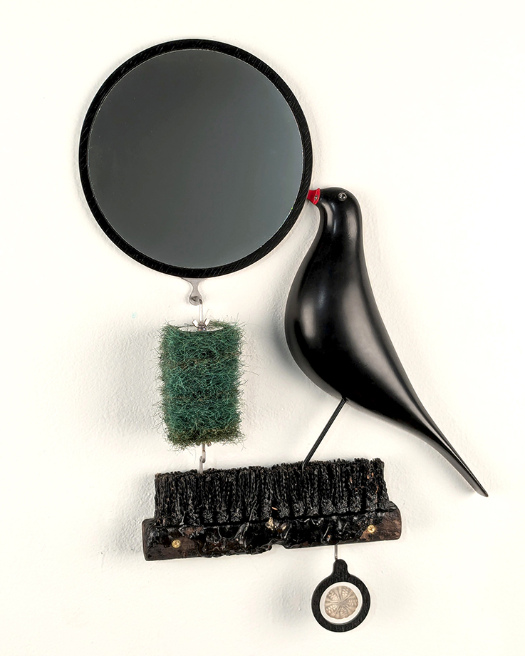 Oil Spill, a wall mirror with artifacts from the cabin