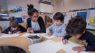 a teacher working with students