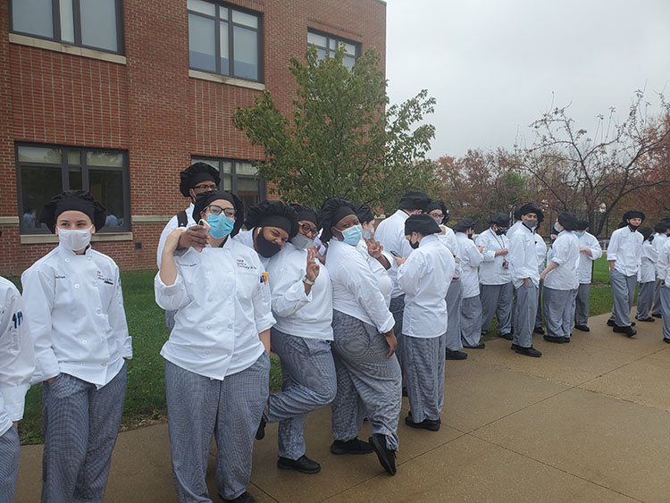 Students in line for hot cocoa & hot cider.