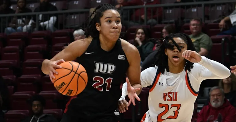 IUP student playing basketball