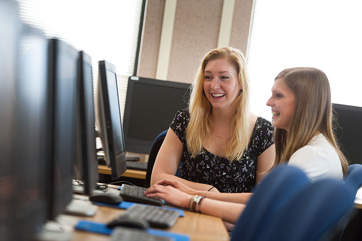 Students in Writing Center at computers