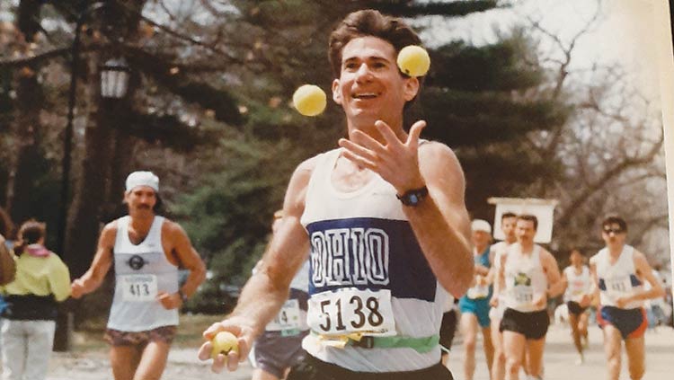 Kerry Green juggling while running