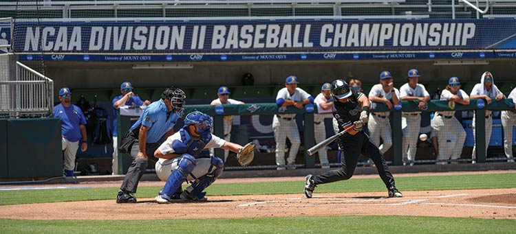 IUP baseball player swinging at a pitch