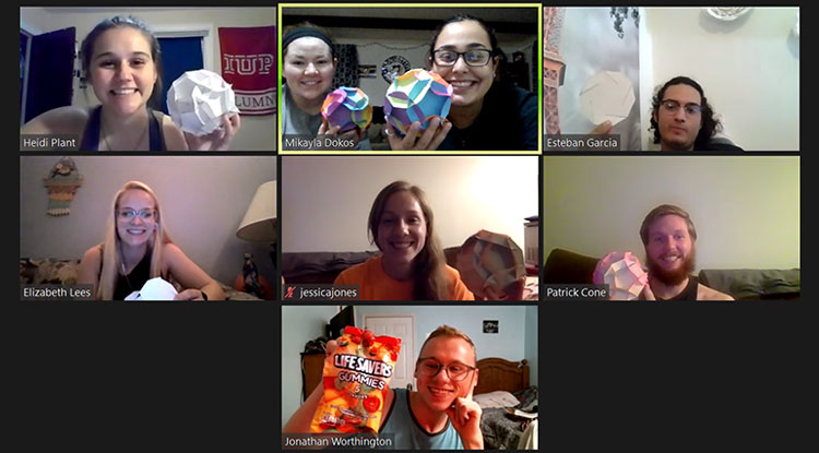 One of the Math Club's activities was making dodecahedrons out of construction paper, which members displayed during a Zoom meeting last fall.