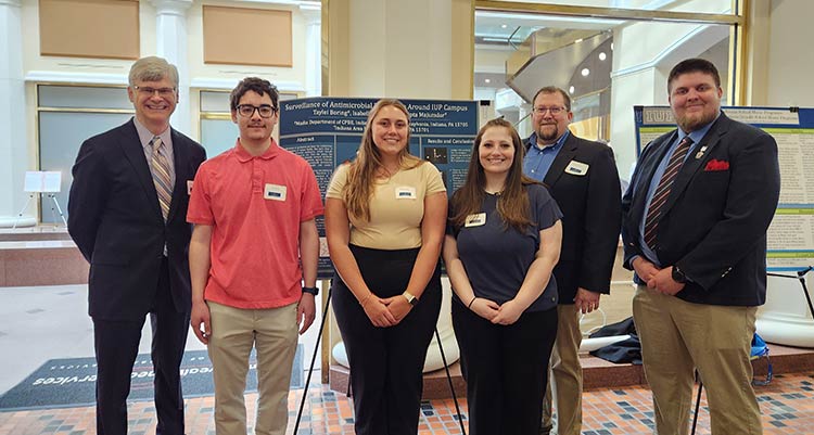 IUP students Alex Tseng, Isabelle Clayton, Taylei Boring, and Sam Shelenberger with faculty mentors Dr. James Jozefowicz and Dr. Nathan McElroy at the 2024 URC-PA event.
