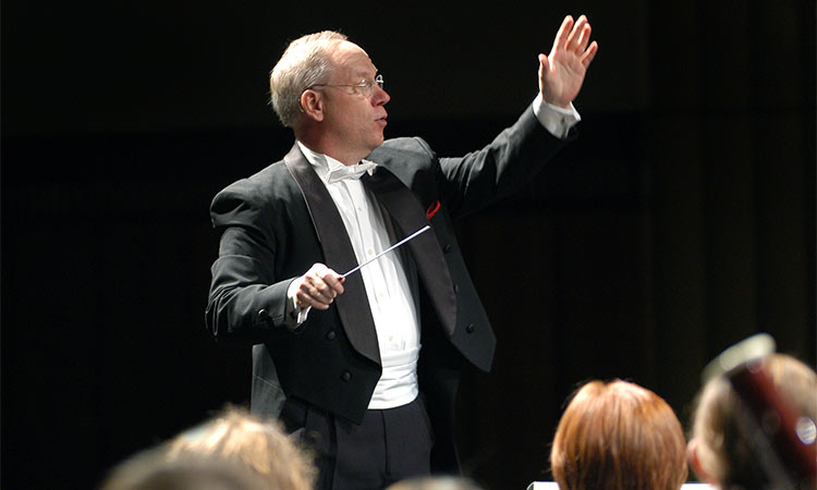 Dr. Jack Stamp leads a performance by an IUP ensemble