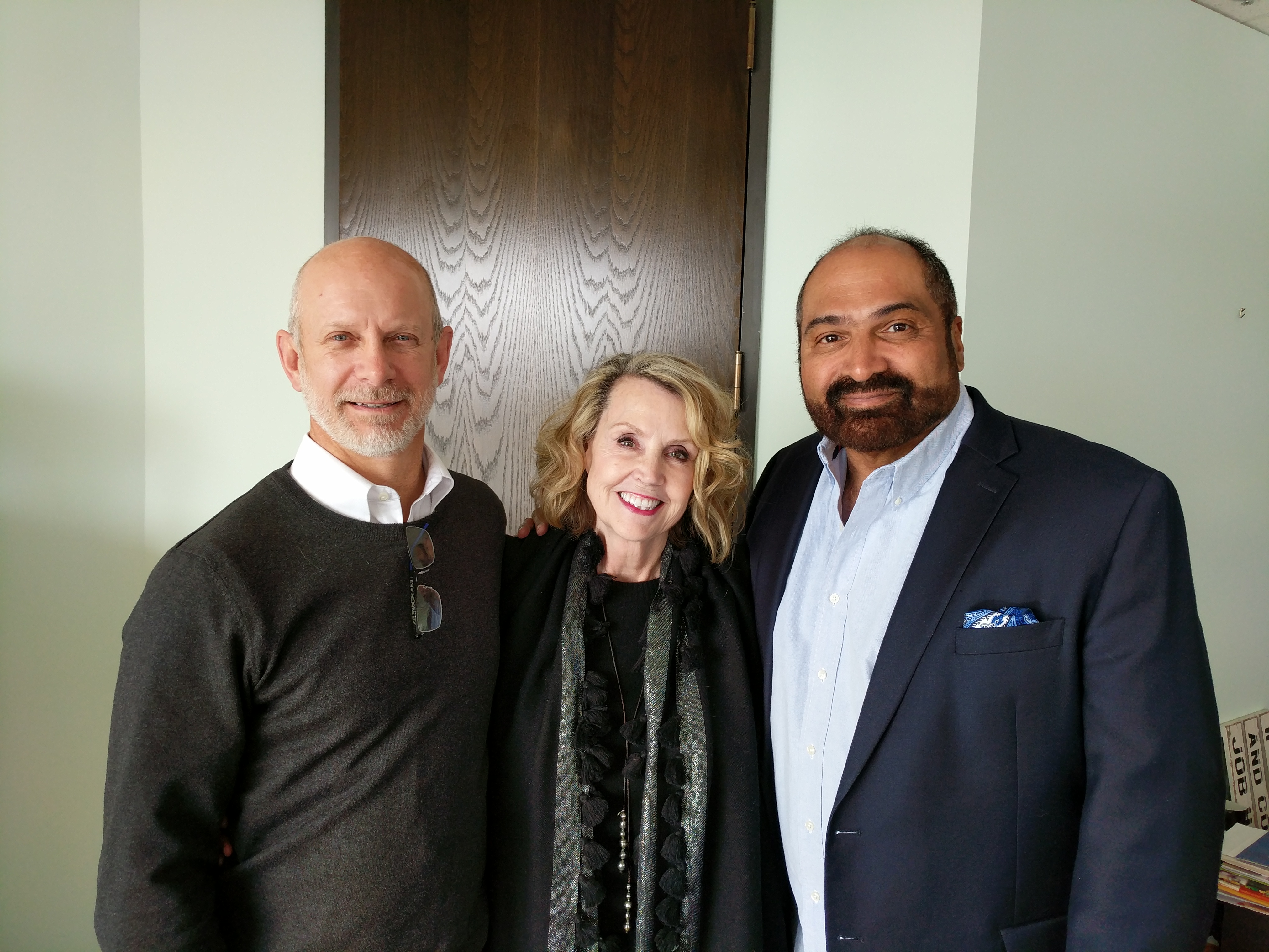 Dr. Erick Lauber,  Committee Co-chair Joyce Sharman, and Franco Harris. Committee Co-chair Vince Mercuri is absent from the photo.