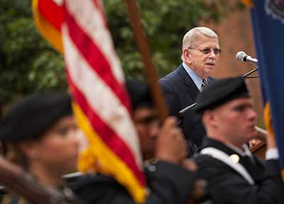 Trustee Glenn Cannon speaks at the 2015 September 11 Remembrance Ceremony